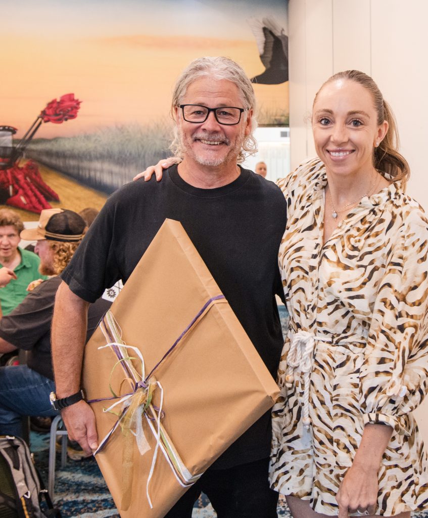 Business coach Chris Beard with client at Sunshine Coast business event